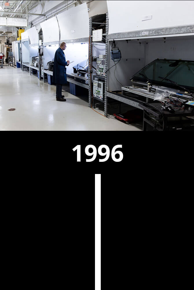 Technician working in the wiper technology center